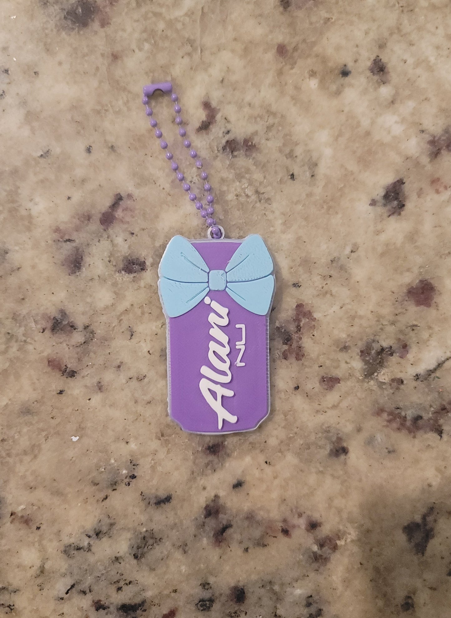Purple Energy Drink Can Nail Saver Keychain