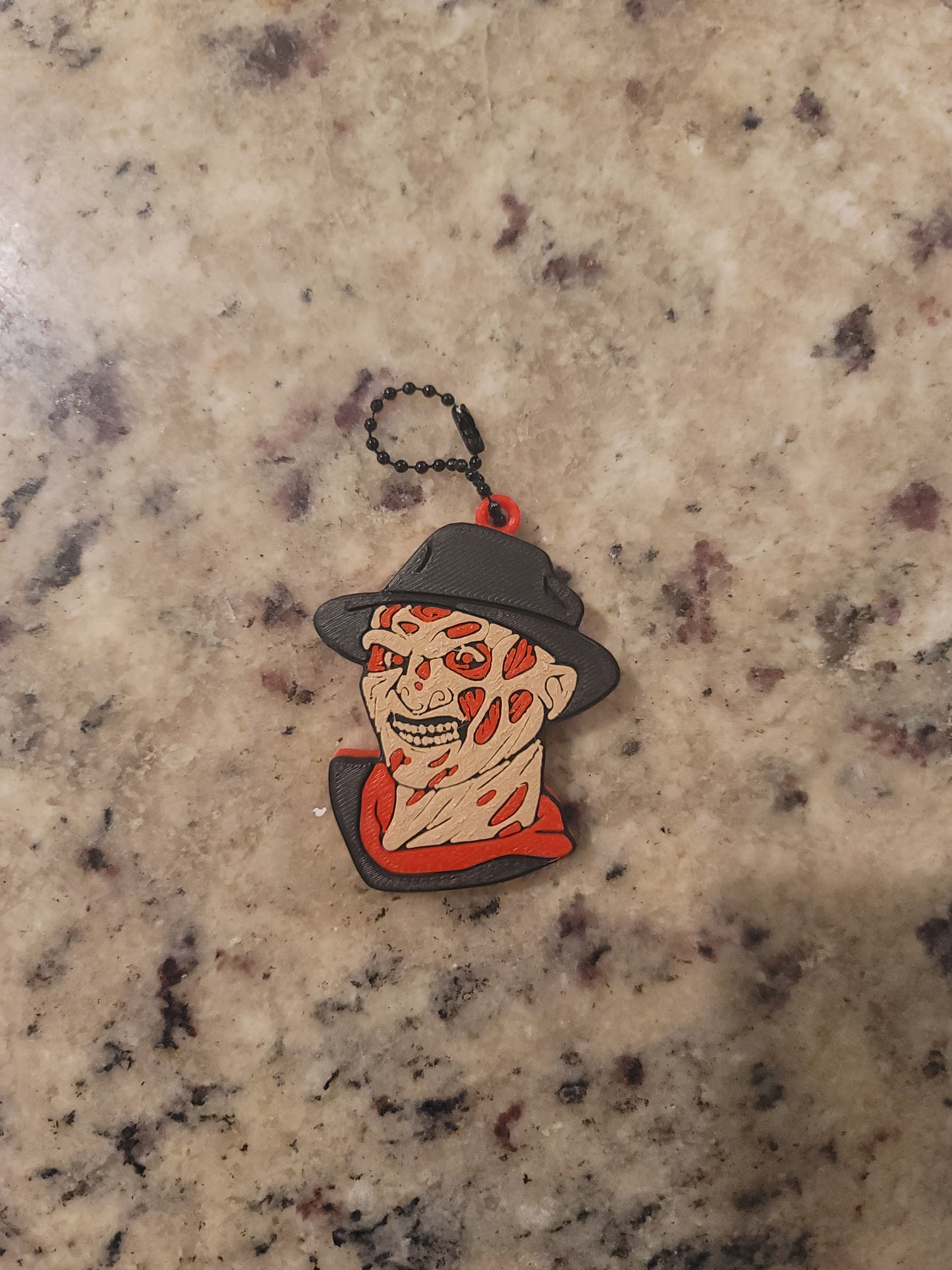 Burned Horror Villain Nail Saver Keychain