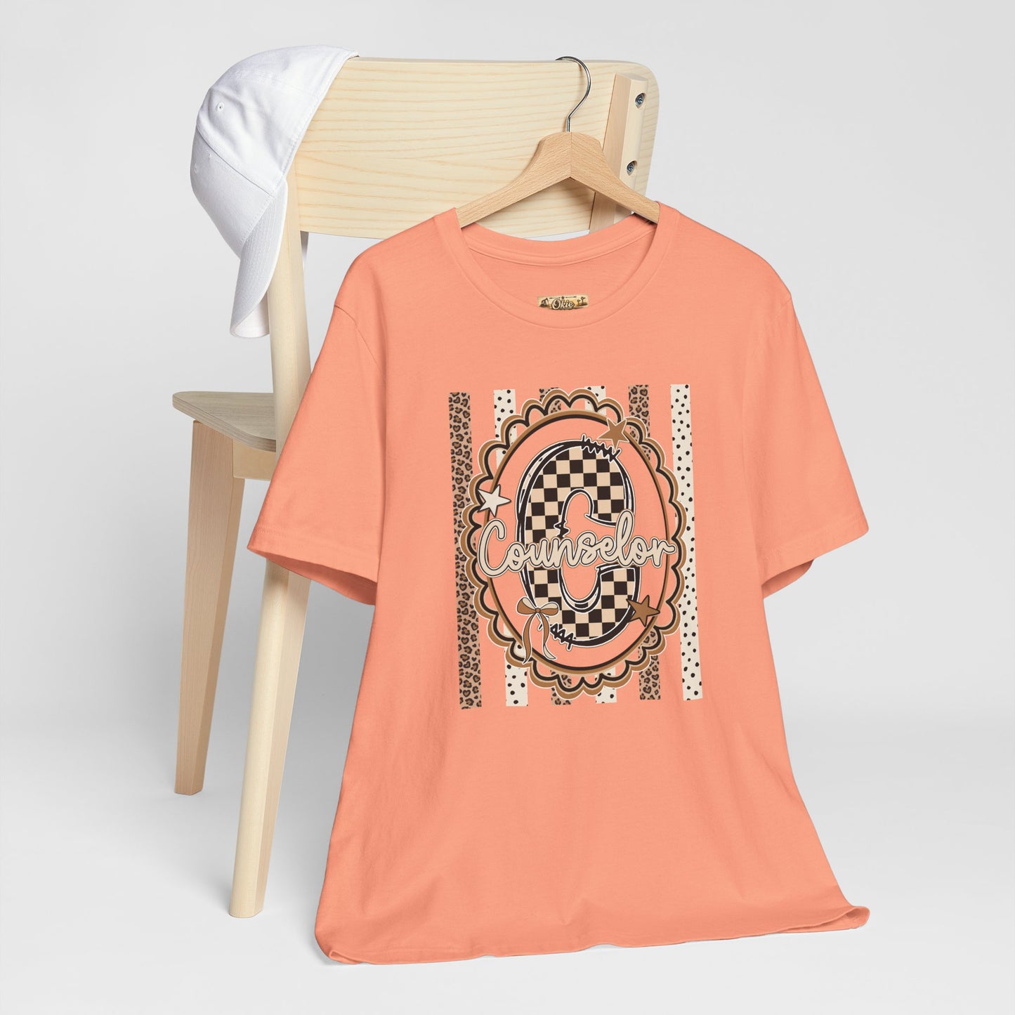 Counselor Tee — Retro Checkerboard & Leopard Print Graphic T-Shirt