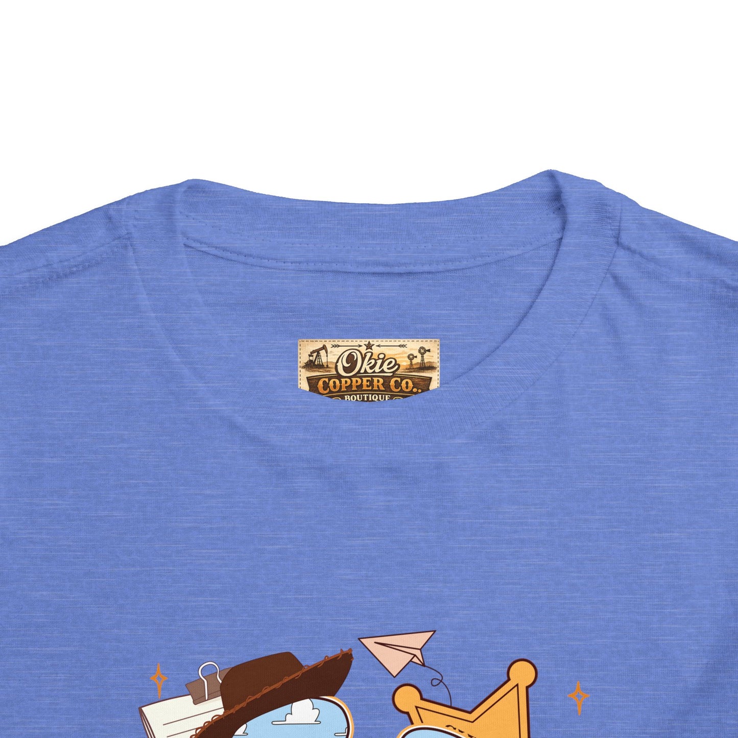 Toddler Tee — Cowboy Baby Western Collage | Sheriff Star, Boots & Wagon Wheel Graphic