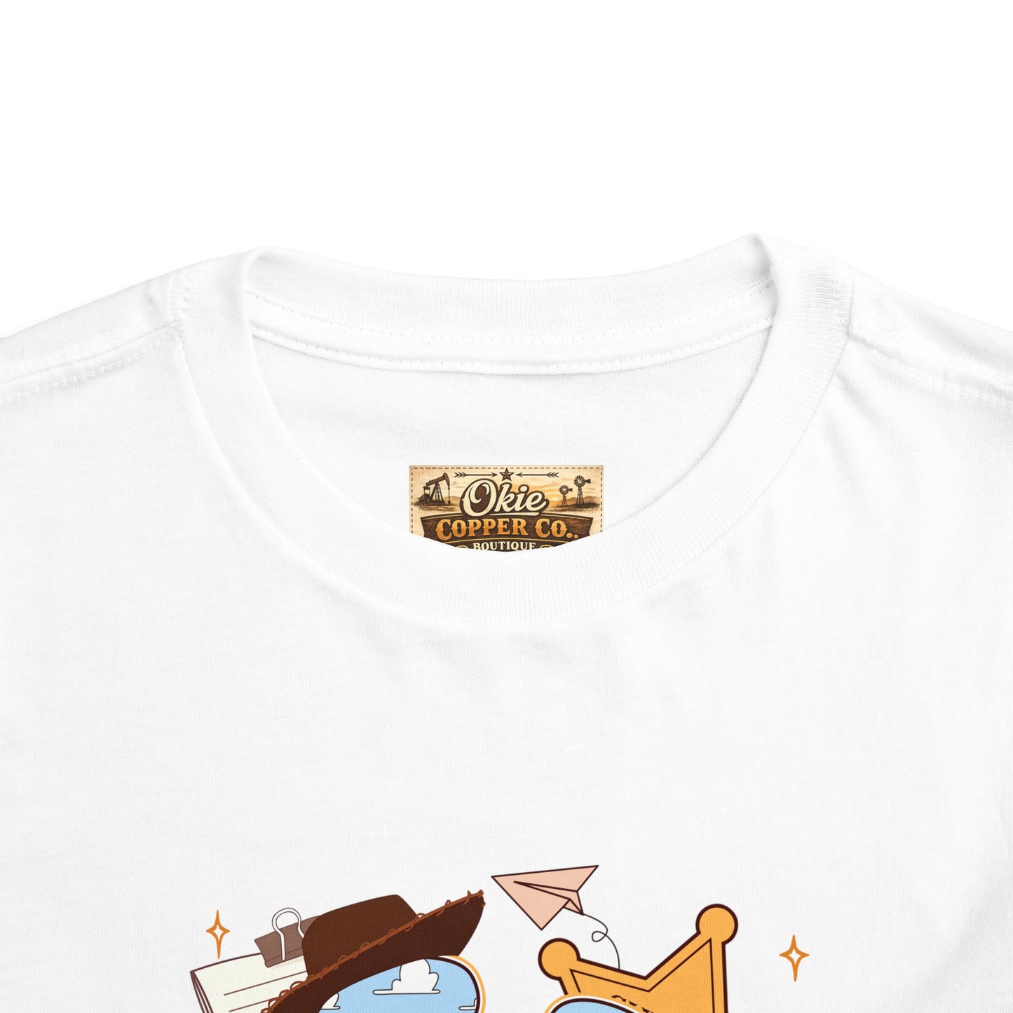 Toddler Tee — Cowboy Baby Western Collage | Sheriff Star, Boots & Wagon Wheel Graphic