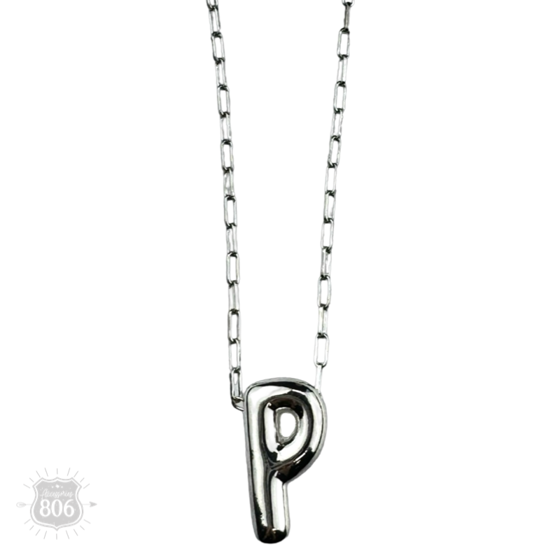 Silver letter pendant on necklace, initial monogram